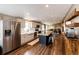 Spacious kitchen featuring a center island with seating and modern stainless steel appliances at 28505 County Road 5, Elizabeth, CO 80107