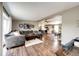 Open living room with hardwood floors flowing into the kitchen at 28505 County Road 5, Elizabeth, CO 80107