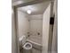 Bathroom with tile floor, combination tub and shower, and toilet at 8826 E Florida Ave # 204, Denver, CO 80247