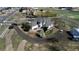 Aerial view of home with mature trees, driveway, outbuilding, and surrounding white fence at 29852 E 163Rd Pl, Brighton, CO 80603