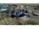 Aerial view of home with a covered patio, RV parking, mature trees, and white fencing at 29852 E 163Rd Pl, Brighton, CO 80603