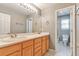 Bathroom with double sink vanity and separate room for the toilet and shower at 29852 E 163Rd Pl, Brighton, CO 80603