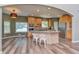 Open concept kitchen and dining area offer ample space and natural light at 29852 E 163Rd Pl, Brighton, CO 80603