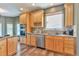 Charming kitchen featuring stainless steel appliances and granite countertops at 29852 E 163Rd Pl, Brighton, CO 80603