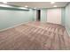 Spacious finished basement with neutral walls and ample storage at 442 S Kalispell Way # C, Aurora, CO 80017