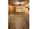 Unfinished two-car garage with built-in shelving at 442 S Kalispell Way # C, Aurora, CO 80017