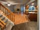 Open living room and kitchen with hardwood floors, fireplace, and high ceilings at 442 S Kalispell Way # C, Aurora, CO 80017