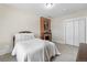 Bright bedroom featuring a fireplace and large closet space at 7996 Bradburn Blvd, Westminster, CO 80030