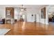 Spacious upper-level bonus room boasts wood floors and architectural details, creating an inviting space at 7996 Bradburn Blvd, Westminster, CO 80030