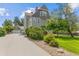 Charming two-story home with well-manicured lawn, beautiful landscaping, and a convenient detached three-car garage at 7996 Bradburn Blvd, Westminster, CO 80030