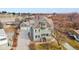 Inviting two-story home with a classic design, complemented by a detached garage and a long private driveway at 7996 Bradburn Blvd, Westminster, CO 80030