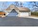 Detached two-car garage with white doors and complementary trim, providing ample parking and storage at 7996 Bradburn Blvd, Westminster, CO 80030