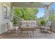 Relaxing outdoor patio space with comfortable seating, area rug, and lush greenery creating a perfect outdoor retreat at 7996 Bradburn Blvd, Westminster, CO 80030