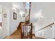 Beautiful wooden staircase with natural light at 7996 Bradburn Blvd, Westminster, CO 80030