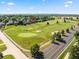 Amazing aerial view of the property nestled next to a golf course in a desirable neighborhood at 1175 Oakhurst Dr, Broomfield, CO 80020