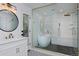 Luxurious bathroom featuring a standalone tub, glass-enclosed shower, and modern fixtures at 1175 Oakhurst Dr, Broomfield, CO 80020