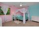 Comfortable bedroom with a canopy bed, soft window lighting, and plenty of storage space at 1175 Oakhurst Dr, Broomfield, CO 80020