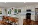 Bright, updated kitchen featuring granite countertops and stainless steel appliances at 1175 Oakhurst Dr, Broomfield, CO 80020