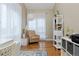 Inviting home office featuring hardwood floors, stylish decor, and plenty of natural light at 1175 Oakhurst Dr, Broomfield, CO 80020