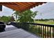 Relaxing deck overlooking a golf course with an awning for shade at 1175 Oakhurst Dr, Broomfield, CO 80020