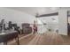 Bright bonus room with a desk, guitars and skylights overlooking the staircase at 14093 E Radcliff Cir, Aurora, CO 80015