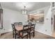 Cozy dining area next to the kitchen, perfect for Gathering meals and entertaining guests at 14093 E Radcliff Cir, Aurora, CO 80015