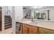 Bright kitchen with stainless steel appliances and a view of the dining area at 14093 E Radcliff Cir, Aurora, CO 80015
