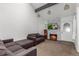 Bright living room with vaulted ceilings, stylish fireplace, and comfortable seating area at 14093 E Radcliff Cir, Aurora, CO 80015