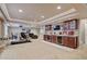 Finished basement with a home theater, wet bar and additional space for entertainment at 17613 E Peakview Ave, Aurora, CO 80016