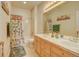 This bathroom offers double sinks and a shower-tub combo at 17613 E Peakview Ave, Aurora, CO 80016