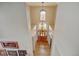 Elegant foyer with soaring ceilings, hardwood floors, and a decorative chandelier at 17613 E Peakview Ave, Aurora, CO 80016