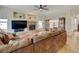 Spacious living room with a fireplace, large windows, and hardwood floors at 17613 E Peakview Ave, Aurora, CO 80016