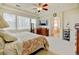 Spacious main bedroom with en-suite bathroom, large windows, and neutral decor at 17613 E Peakview Ave, Aurora, CO 80016