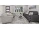 Bright living room featuring modern gray decor and a large bay window with natural light at 4953 W 61St Ave, Arvada, CO 80003