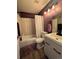 A well-lit bathroom featuring a tub-shower combination, vanity and tile accents at 4416 E 93Rd Pl, Thornton, CO 80229
