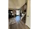Comfortable living area with wood floors, a staircase, and a welcoming atmosphere at 4416 E 93Rd Pl, Thornton, CO 80229