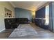 Inviting living room featuring stylish wood floors, a cozy rug and comfortable seating at 4416 E 93Rd Pl, Thornton, CO 80229