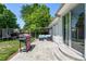 Outdoor patio with a grill, outdoor seating, and a sliding glass door leading inside, ideal for entertaining at 4416 E 93Rd Pl, Thornton, CO 80229