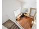 Aerial view of a home office with large desk situated near the front door at 7342 S Mobile St, Aurora, CO 80016