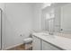 Modern bathroom featuring a glass shower, stylish flooring, and granite vanity at 240 Lark Sparrow Way, Bennett, CO 80102