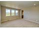 Bedroom with neutral carpet, great light and an ensuite bathroom at 39210 Anthony St, Elizabeth, CO 80107