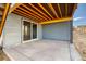 Concrete patio featuring wood ceiling and support beams at 39210 Anthony St, Elizabeth, CO 80107