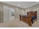Large bedroom with a dark-wood bed and easy access to the rest of the house at 4726 Pinon Dr, Elizabeth, CO 80107