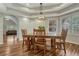 Bright dining room with decorative lighting and plenty of natural light at 4726 Pinon Dr, Elizabeth, CO 80107