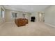 Spacious living area featuring a comfortable couch, TV, and large windows with views at 4726 Pinon Dr, Elizabeth, CO 80107