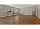 Spacious living room with wood floors and a view of the outdoors at 4726 Pinon Dr, Elizabeth, CO 80107