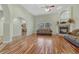 Inviting living area with hardwood floors, fireplace, large windows, and elegant architectural details at 4726 Pinon Dr, Elizabeth, CO 80107