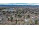 An aerial view of a quiet neighborhood near a pond and green spaces at 5982 S Aberdeen St, Littleton, CO 80120
