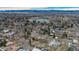 A high angle aerial view of the neighborhood with a pond in the distance at 5982 S Aberdeen St, Littleton, CO 80120