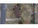 Aerial view of home showing brown roof and proximity to park and street at 5982 S Aberdeen St, Littleton, CO 80120